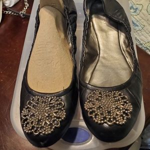 Tahari medallion leather flats